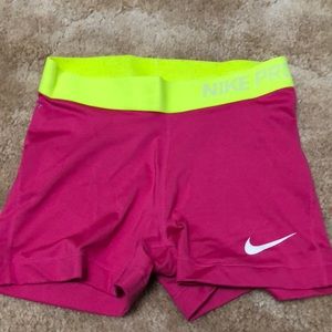 Pink and neon yellow dri-fit Nike Pro